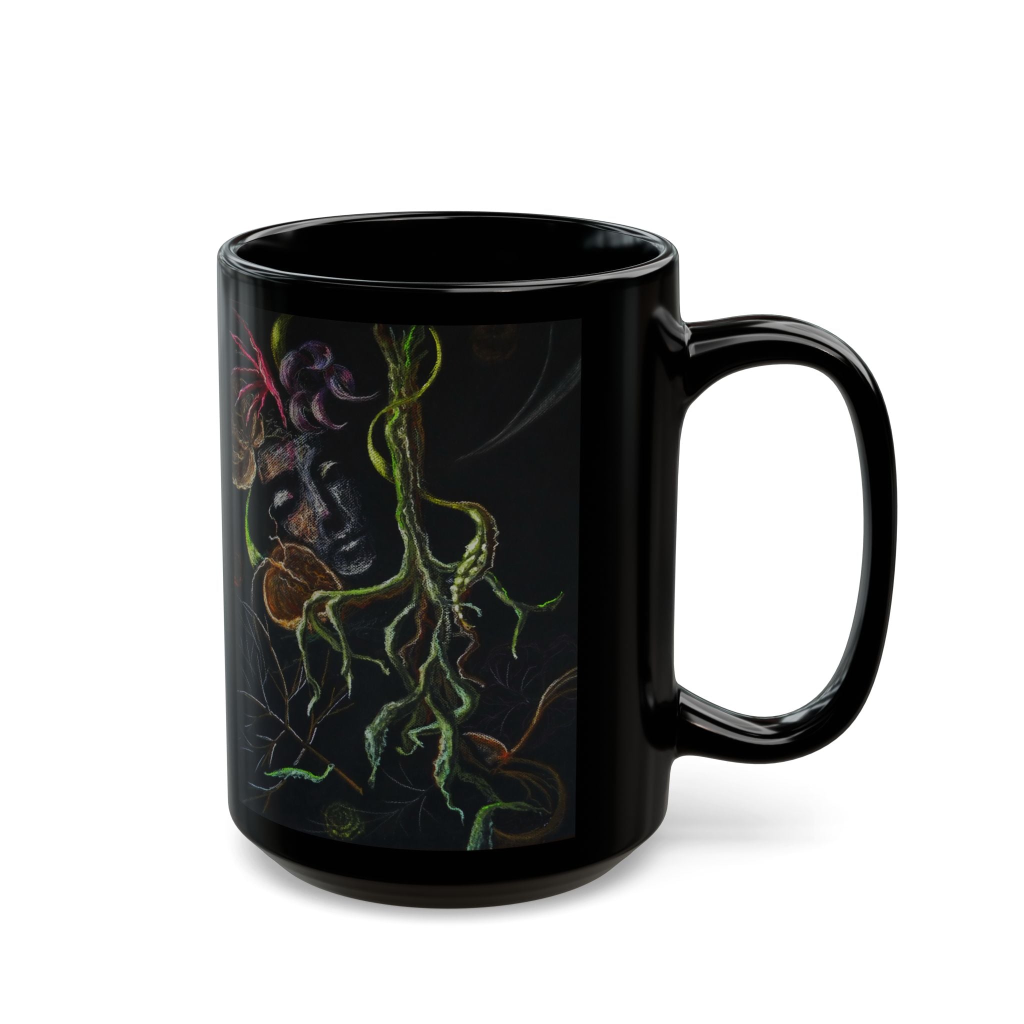Black mug with artistic design of a face and roots on a black background