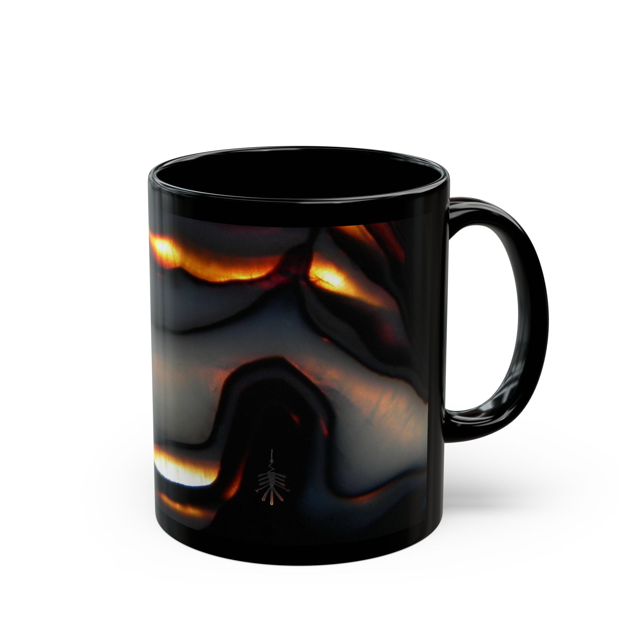 Black mug with abstract design on a black background