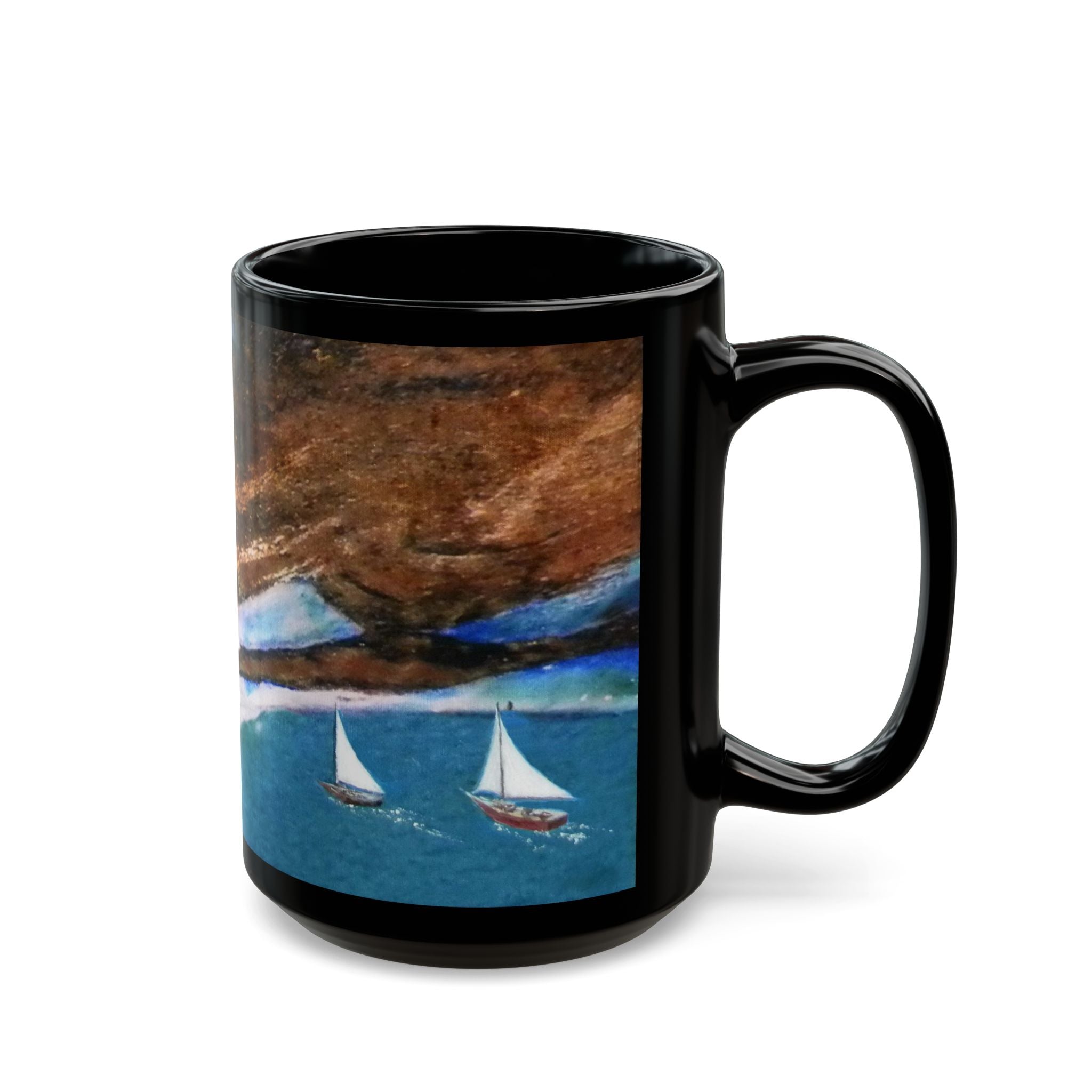Black mug with a scenic design of sailboats on water and mountains.