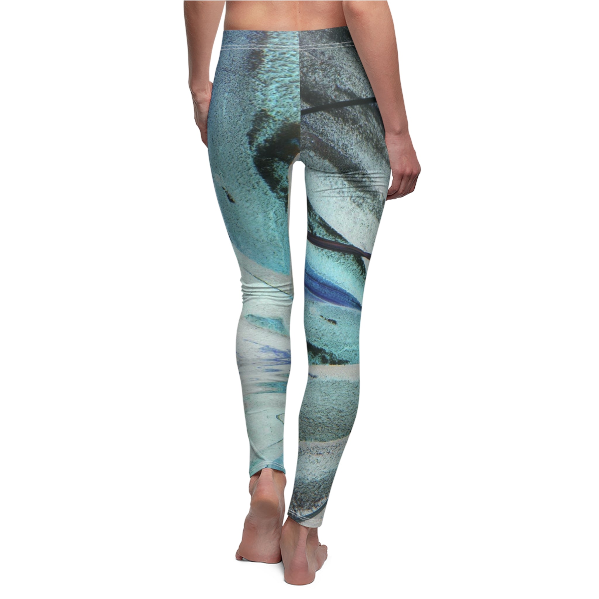 Leggings with a nature-themed design on a white background