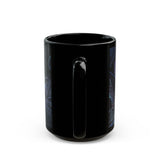 Black mug with a handle on a white background