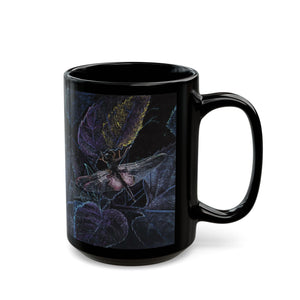 Black mug with a dragonfly design on a white background