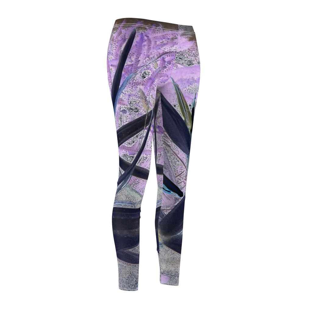 Leggings with a purple and black abstract pattern on a white background
