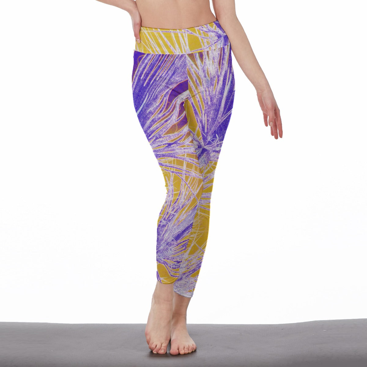 Colorful patterned leggings worn by a person on a white background