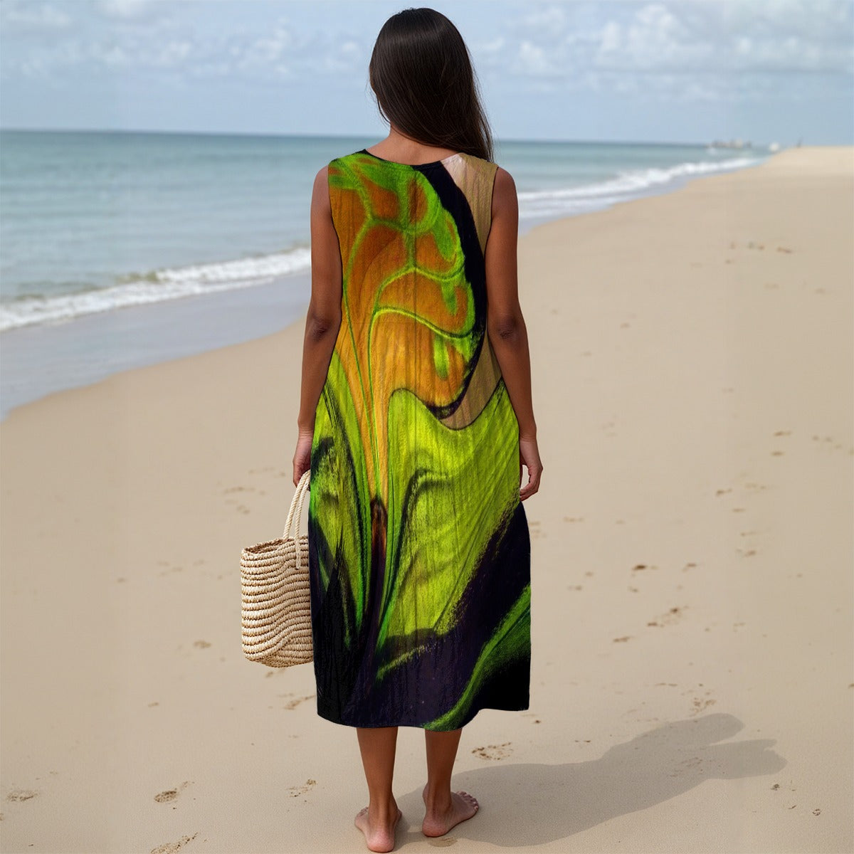 Woman in a colorful dress standing on a beach