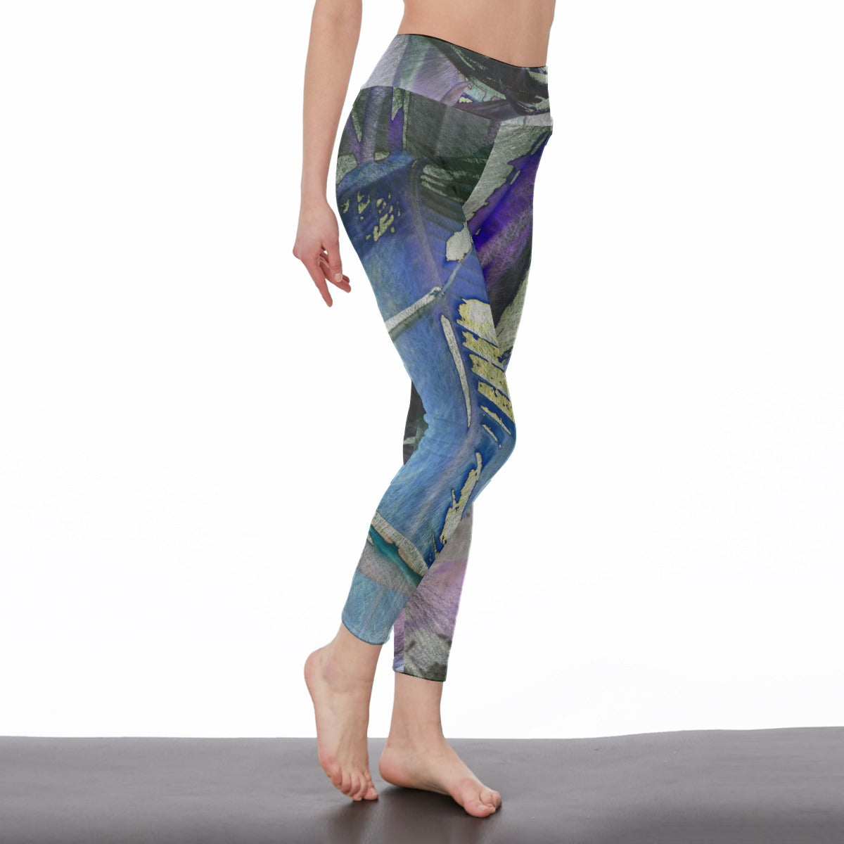 Colorful patterned leggings worn by a person on a white background