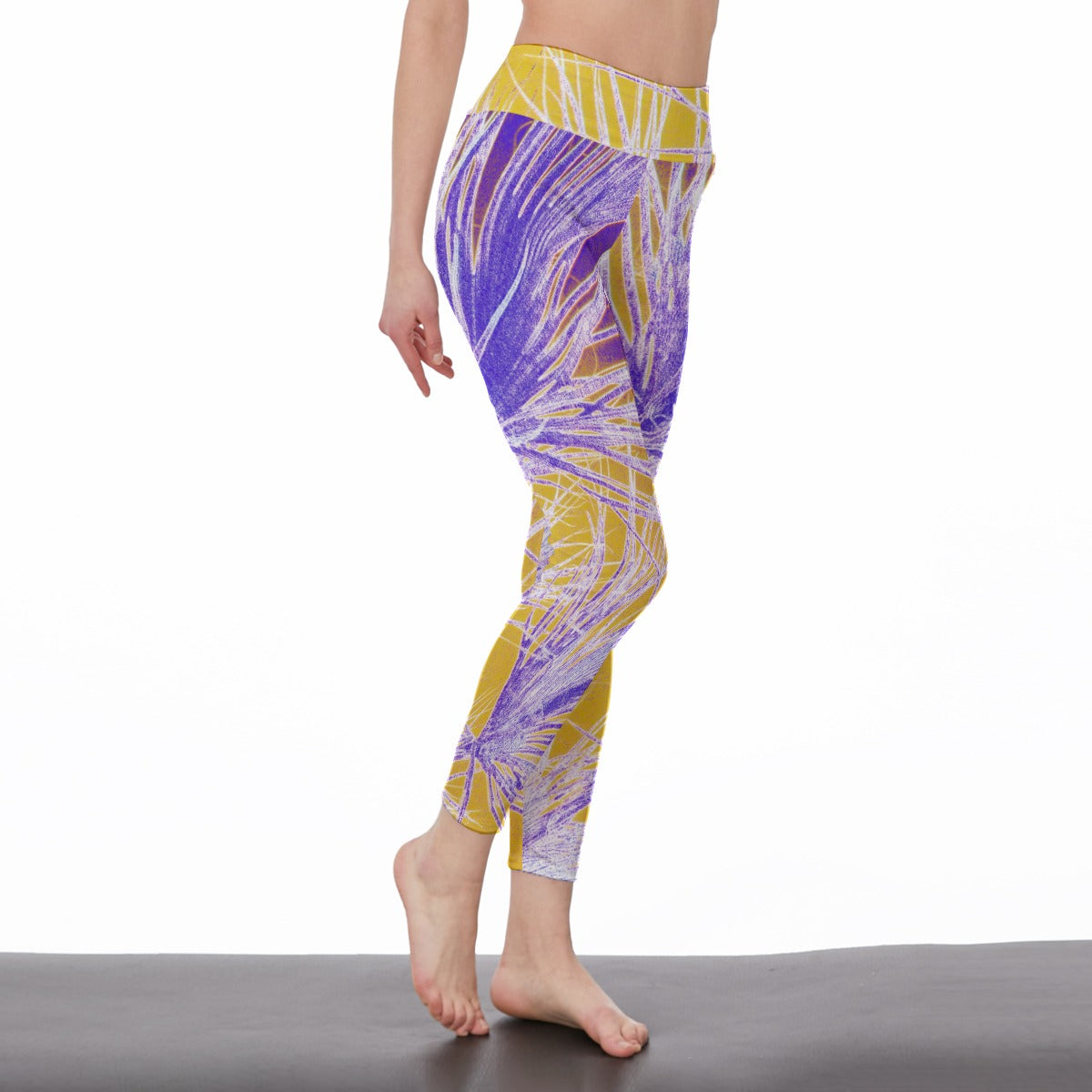 Colorful leggings with a purple and yellow pattern on a white background
