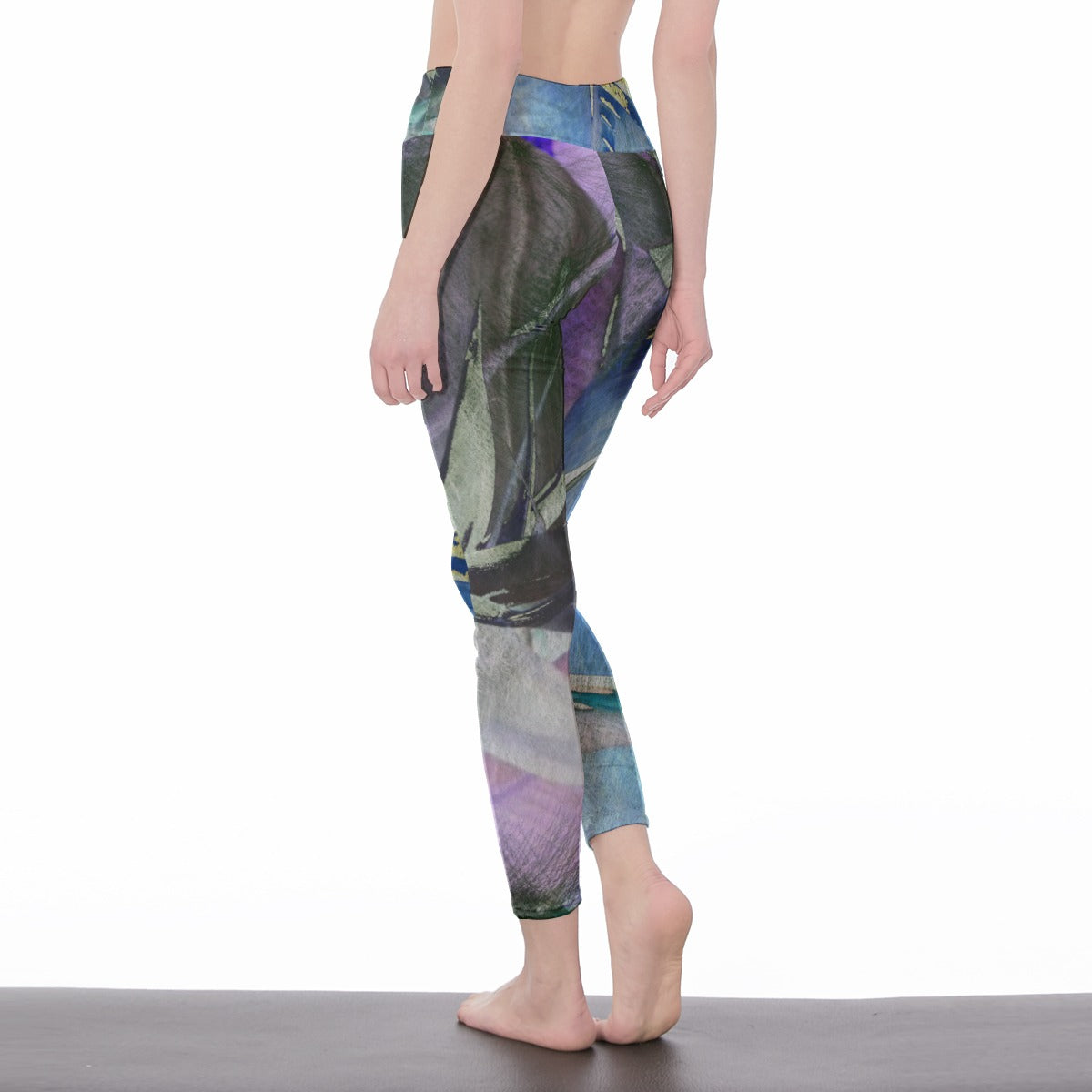 Person wearing colorful leggings with a nature-themed design on a white background