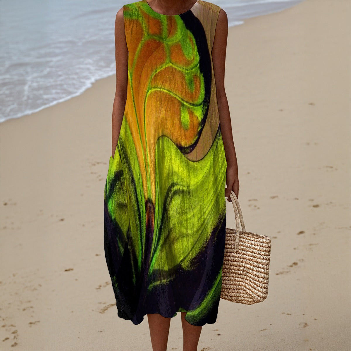 Person wearing a colorful dress on a beach holding a woven bag