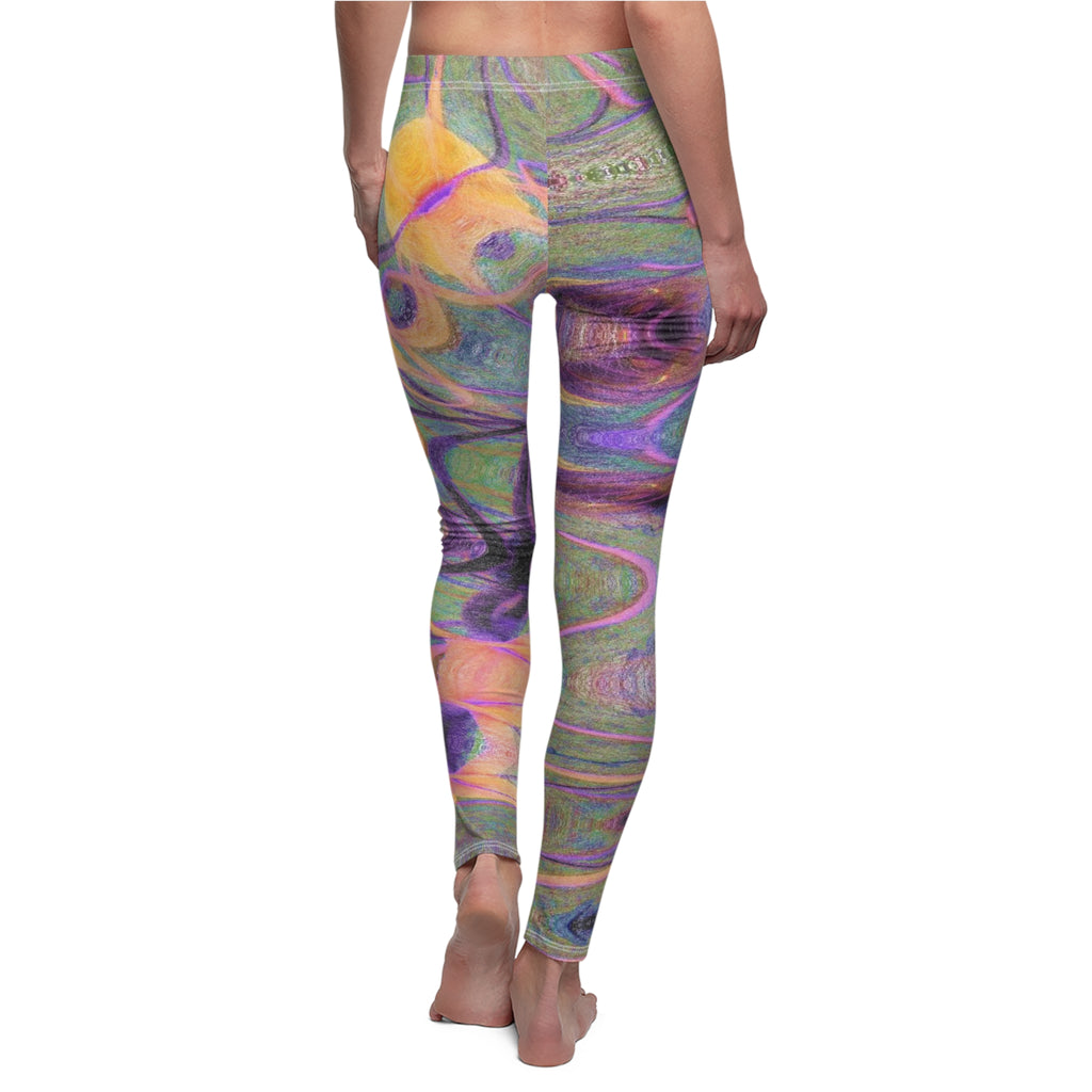 Colorful patterned leggings worn by a person on a white background