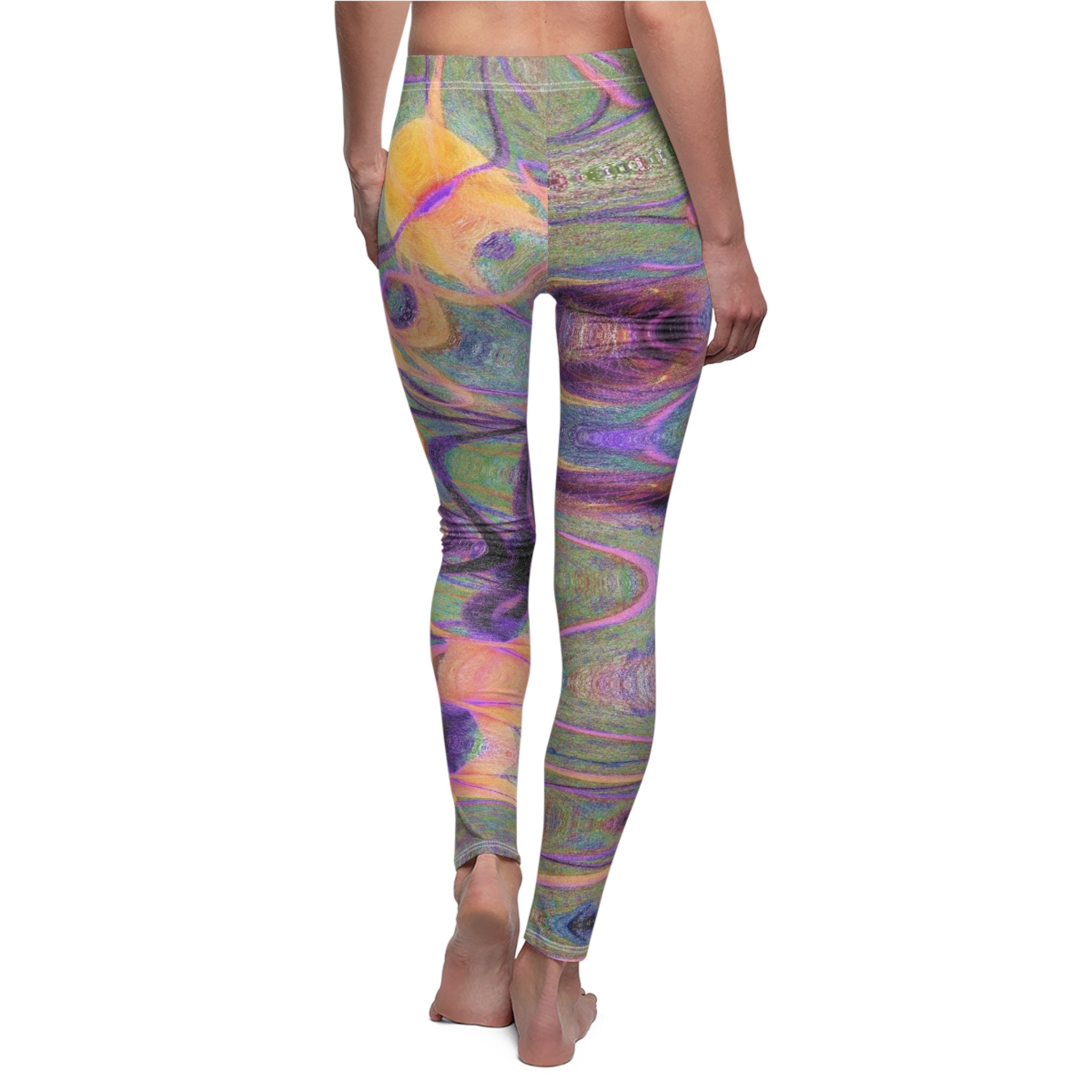 Colorful patterned leggings worn by a person on a white background