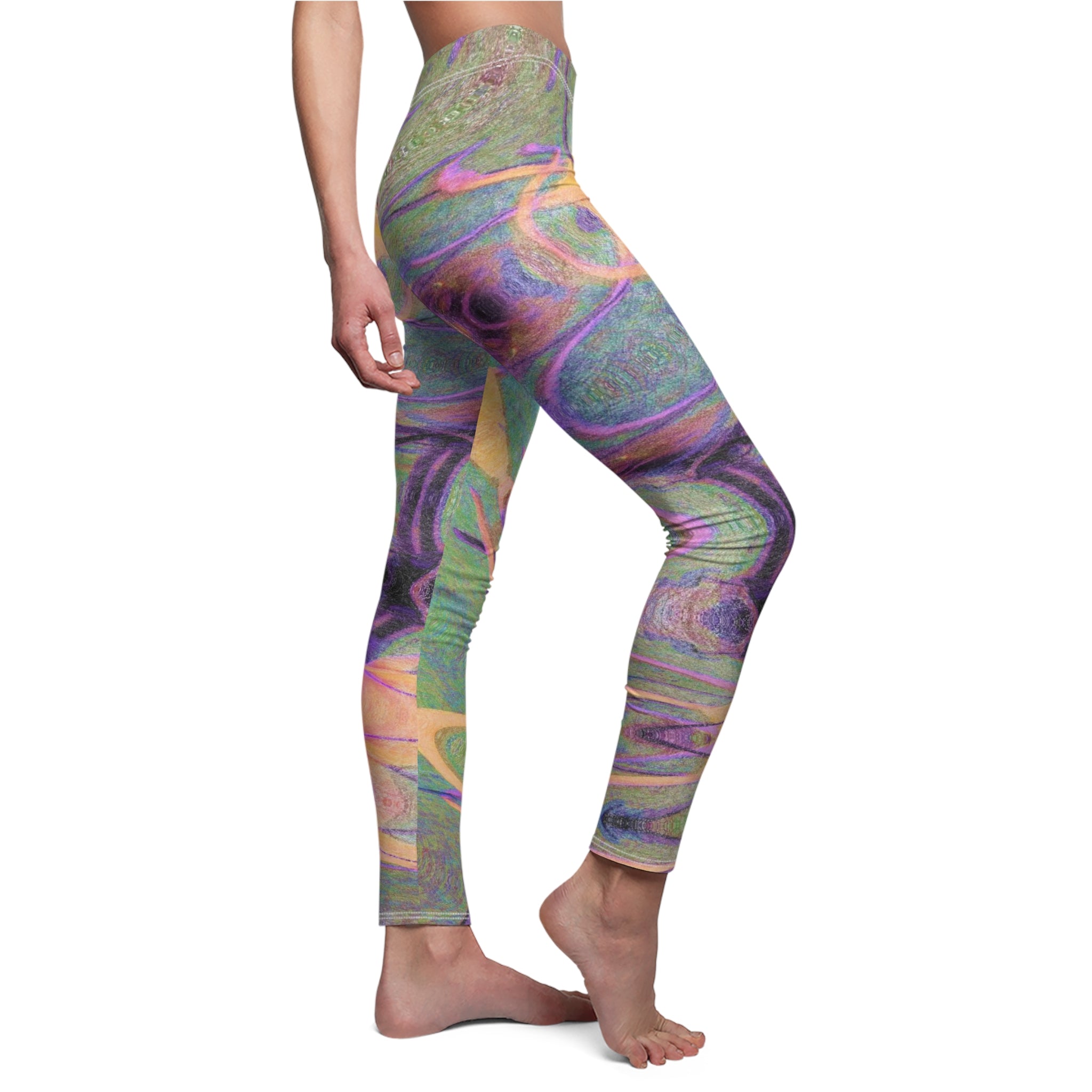 Colorful patterned leggings worn by a person on a white background