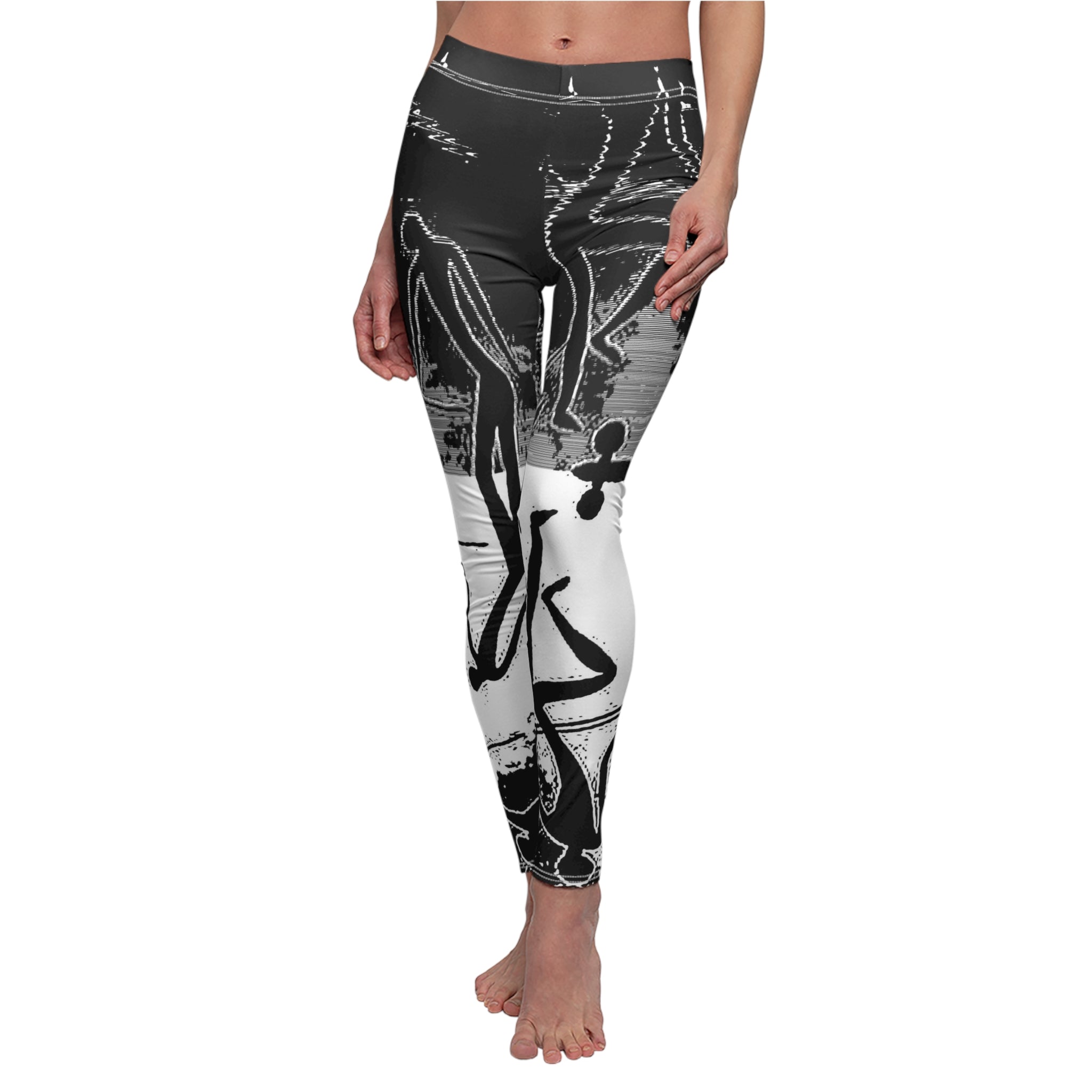 Black and white patterned leggings worn by a person on a white background