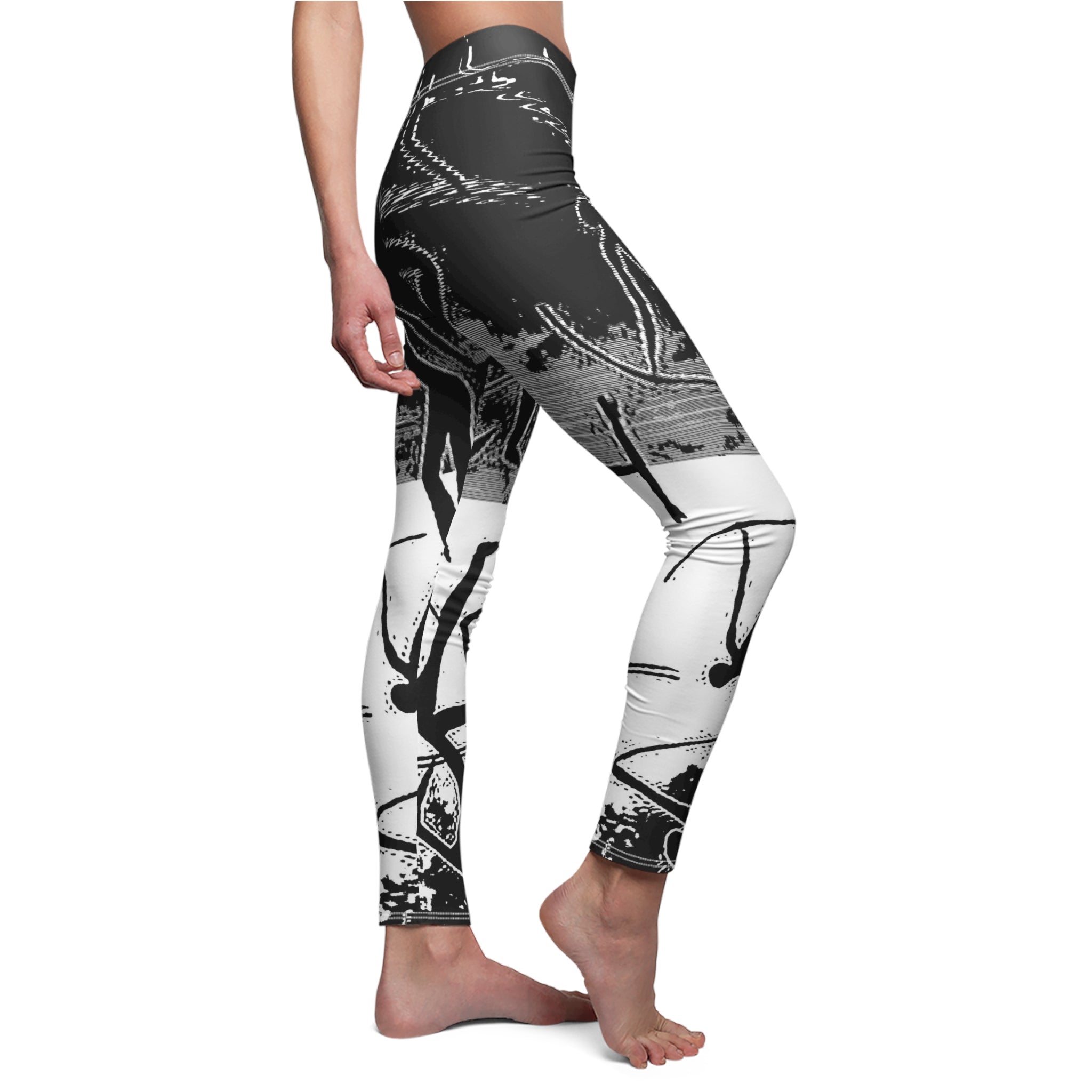 Black and white patterned leggings worn by a person on a white background
