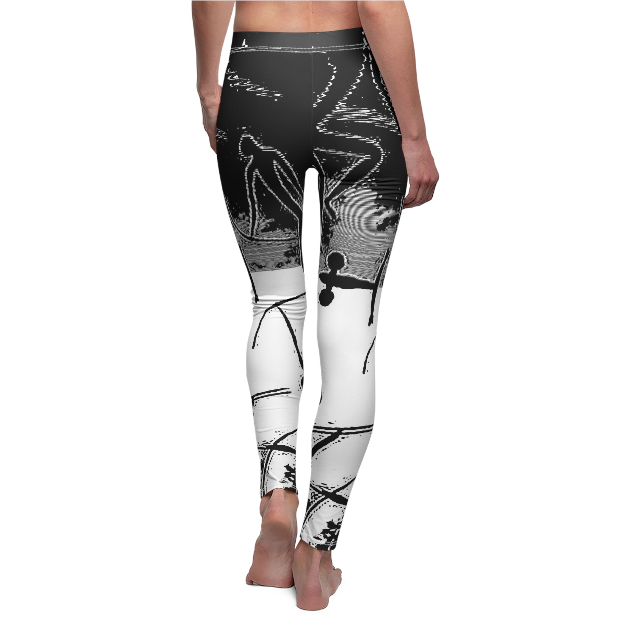 Black and white patterned leggings worn by a person on a white background