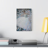 Framed artwork of a dancer in a white dress on a wall above a desk with books and a lamp.