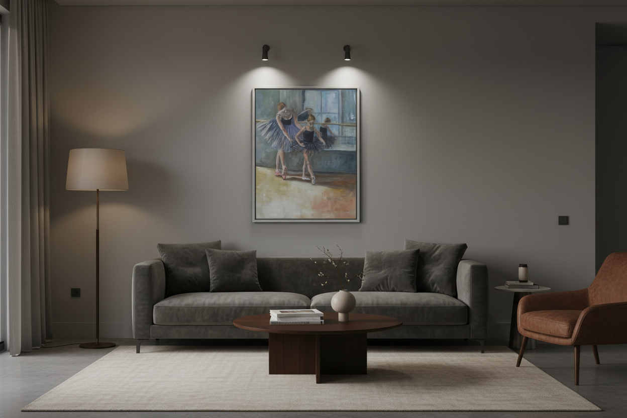 Artwork in silver frame displayed in low light living room